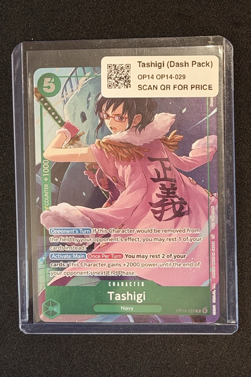Real printed QR product label applied to the top of a trading-card holder