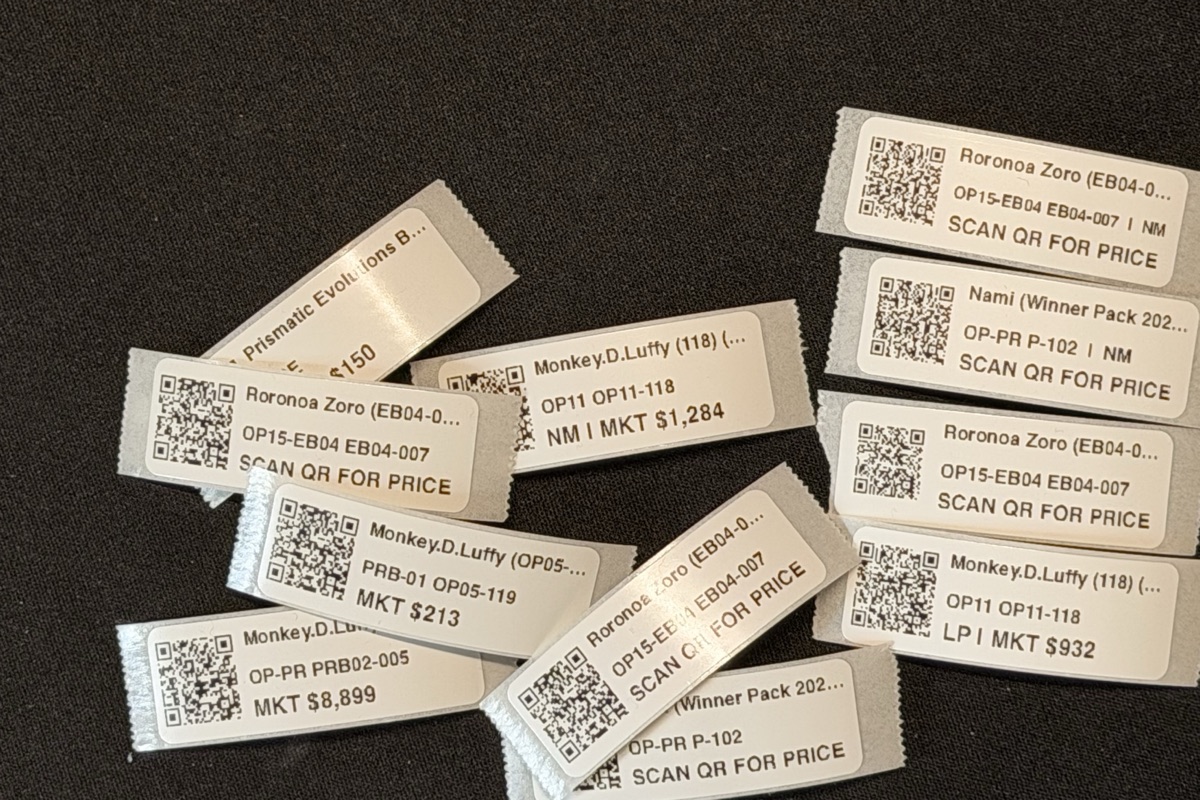 Collection of real QR-only and market-price labels printed by TCG Printer